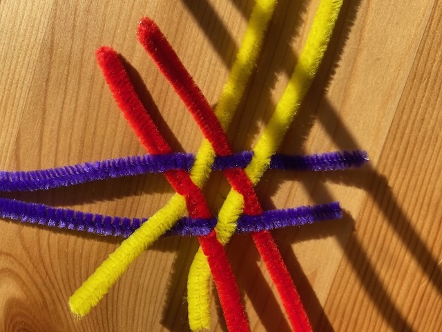 3 pairs of parralel pipe cleaners, woven together as a hexagon